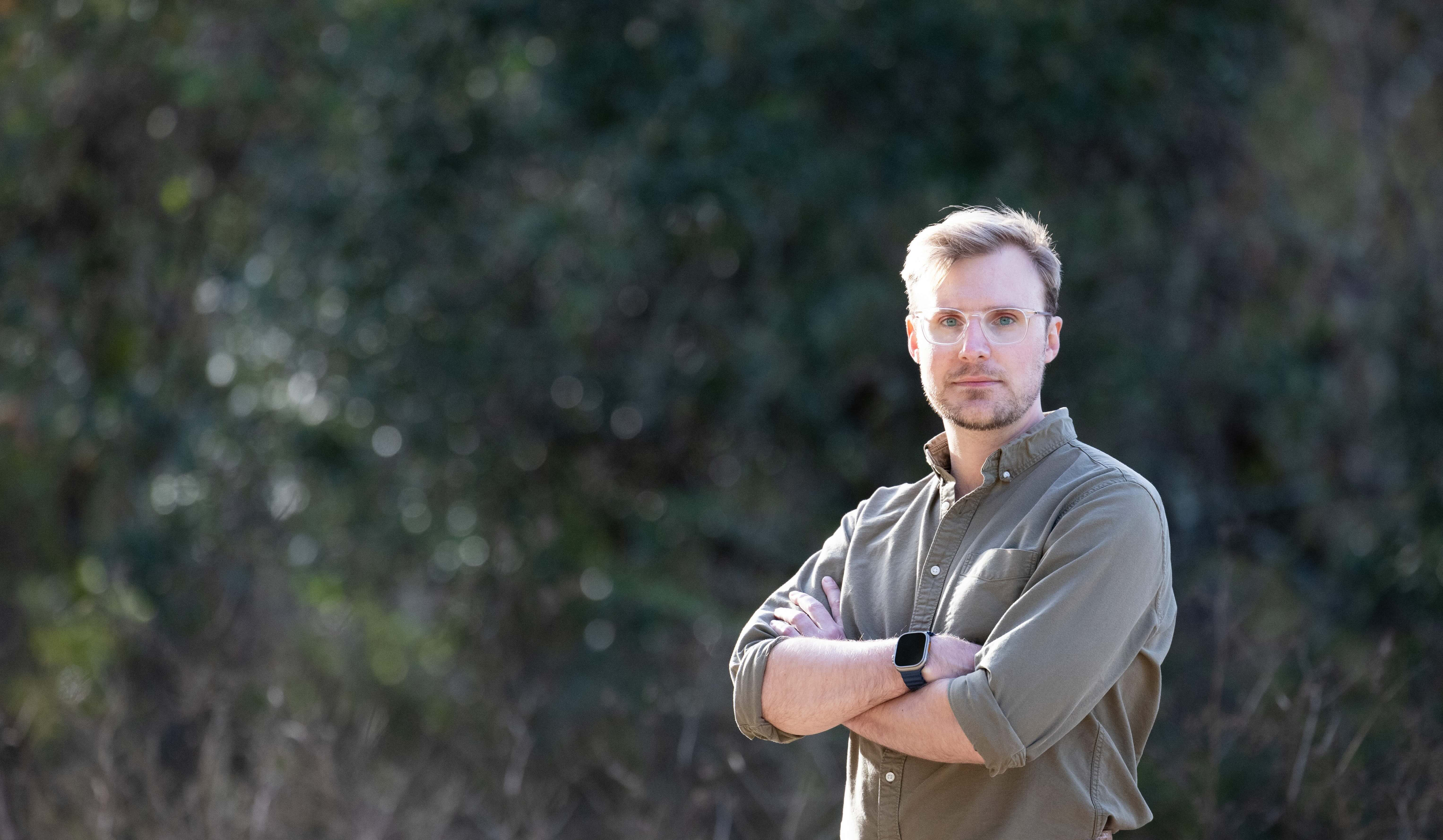 photo of Joe Kalicki standing ina a wooded area